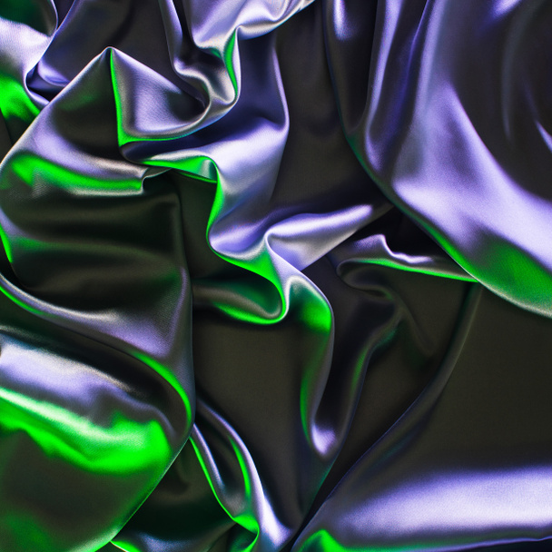 green and violet crumpled shiny silk fabric background - Foto, Imagem