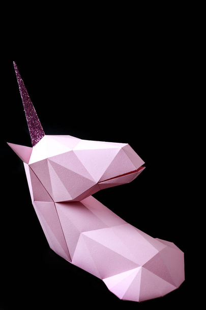 Pink unicorn on a black background. 3d model of a unicorn. Copy space - Photo, Image
