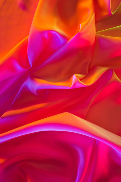 pink and orange shiny silk fabric background - Photo, image