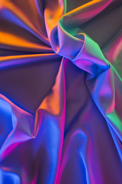 violet and green shiny silk fabric background - Foto, afbeelding