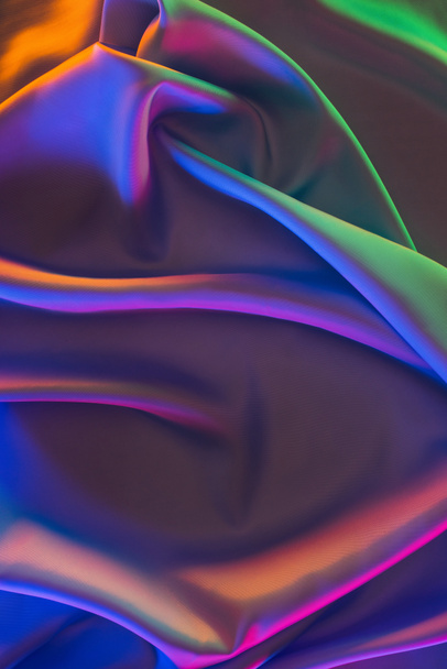 colored shiny satin fabric background - Фото, изображение