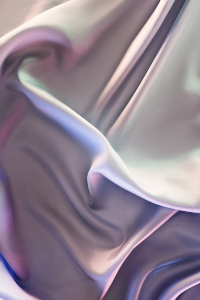 light violet and beige shiny silk fabric background - Foto, afbeelding