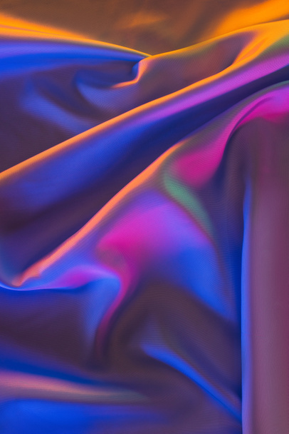orange, blue and pink shiny silk fabric background - Foto, Imagem