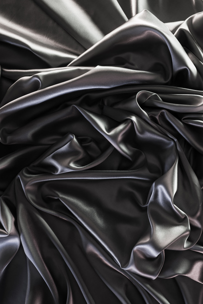 dark silver shiny silk fabric background - Fotografie, Obrázek