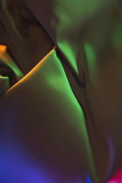 green dark shiny silk fabric background - Фото, зображення