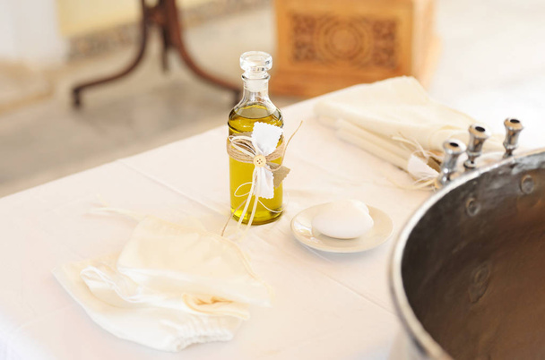 greek Orthodox christening decoration - baptism oil, soap and candles - Photo, Image