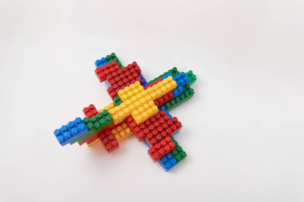 figures from a colored cubes designer on a white background - Photo, Image