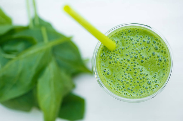 Green fresh healthy spinach and banana smoothie. Detox drink - Φωτογραφία, εικόνα