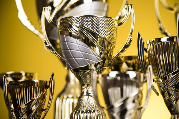 Award winning and championship concept, trophy cup on sport background - Photo, Image