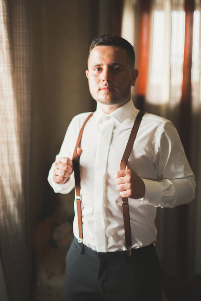 Luxury groom prepares for wedding in hotel - Fotografie, Obrázek