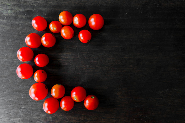 Red Cherry Tomatoes: High Vitamin C Healthy good food with space for text - Photo, Image