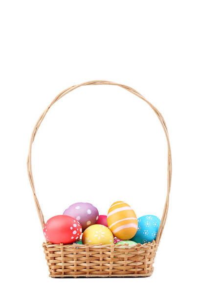 Easter eggs in basket isolated on white background - Photo, image