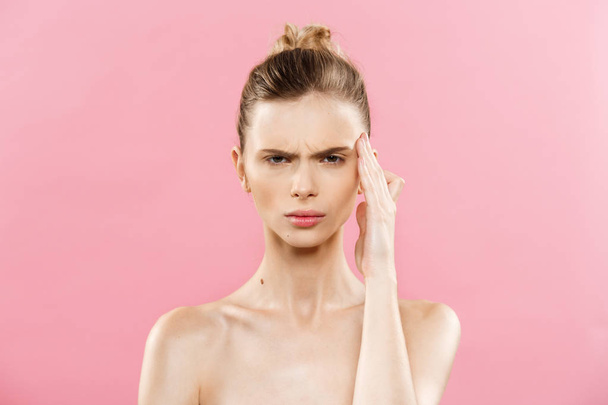 Beauty Concept - Beautiful Caucasian woman with clean skin, natural make-up isolated on bright pink background with copy space. - Photo, Image