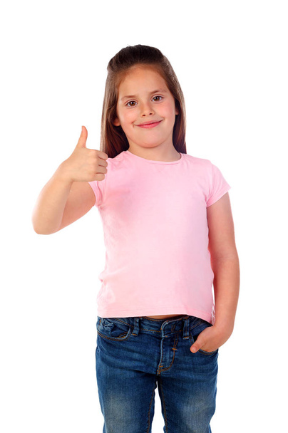 boldog kis lány mutatja a hüvelykujjával felfelé a elszigetelt fehér háttér - Fotó, kép