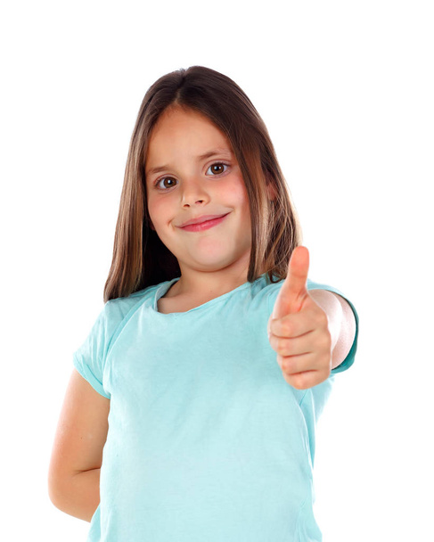 счастливая маленькая девочка, показывающая большой палец на белом фоне
 - Фото, изображение