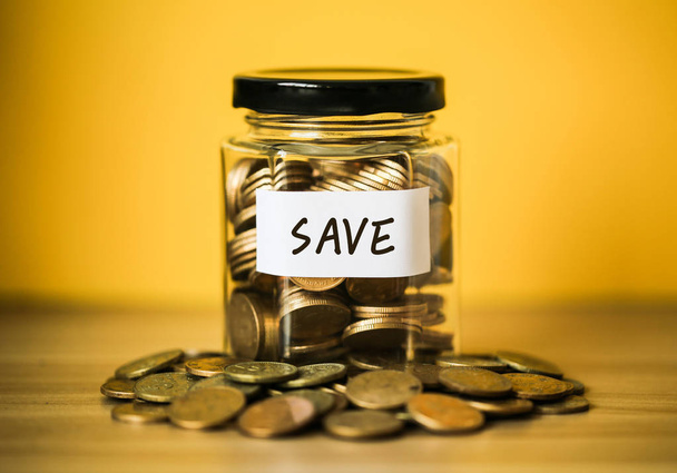 Coins In Glass Save Money Jar - Фото, изображение
