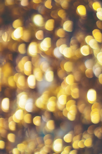 abstract blurry background of gold bell - Φωτογραφία, εικόνα