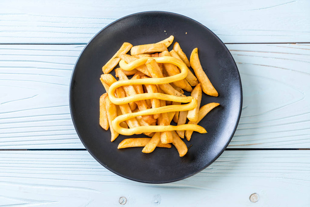 french fries with cheese - Zdjęcie, obraz
