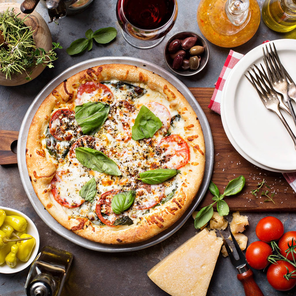 Margherita pizza with basil - 写真・画像