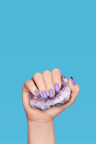 Manicure. Hand With Stylish Nails Holding Purple Gemstone - Zdjęcie, obraz