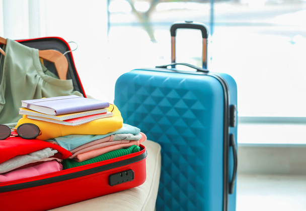 Packed travel suitcases indoors - Fotó, kép