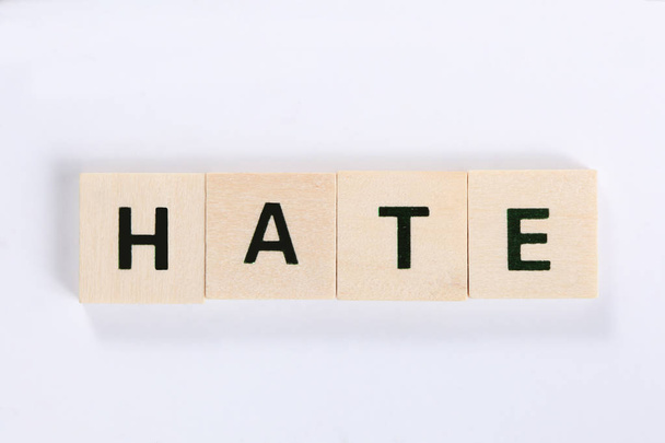 word hate made of wooden block isolated on white background - Valokuva, kuva
