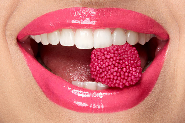 Pink Lips. Woman With Candy In Mouth. - Foto, imagen