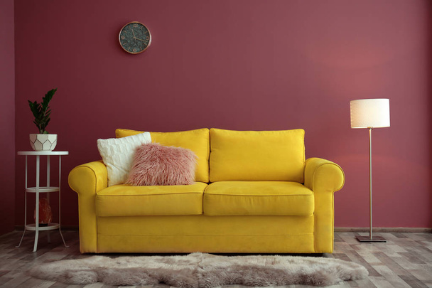 Elegant room interior with comfortable sofa - Fotoğraf, Görsel