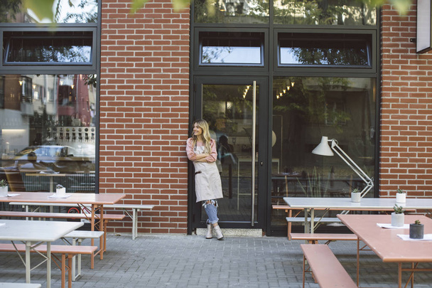 Waitress Standing on Cafe Doors - Fotoğraf, Görsel