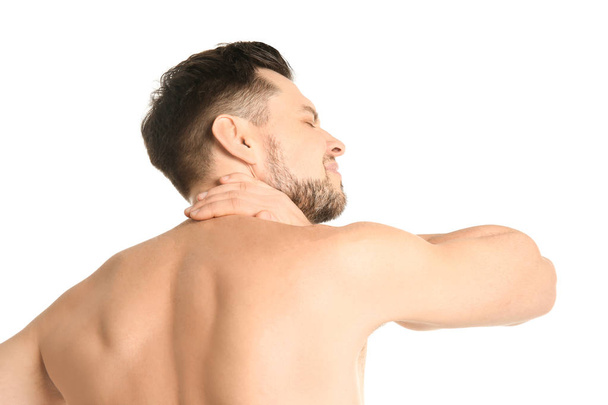 Young man suffering from neck pain on white background - Fotografie, Obrázek