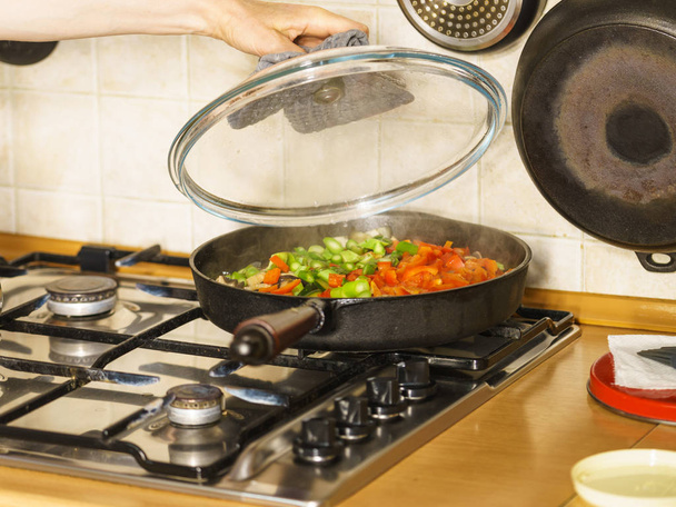 Chopped vegetables on frying pan - Fotó, kép