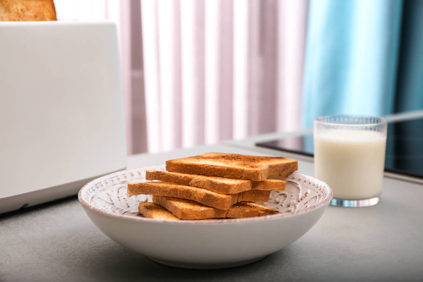 toasted bread and glass of milk - Φωτογραφία, εικόνα
