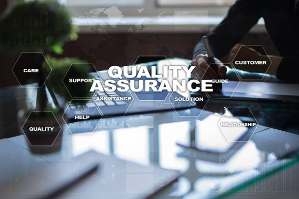 Quality assurance concept on the virtual screen. Business concept. - Photo, image