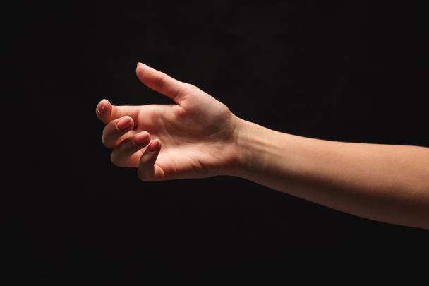 Wyciągniętą ręką kobiety oferty lub prosząc o pomoc - Zdjęcie, obraz