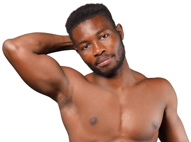 Handsome guy showing his strong torso isolated on white background - Foto, afbeelding