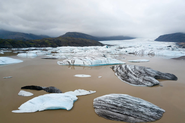 Flajkull es un glaciar de Islandia, situado al este de Islandia, en el Parque Nacional Vatnajkull, cerca de la ciudad de Hofn y es un drainglacier del gran glaciar Vatnajkull.
. - Foto, imagen