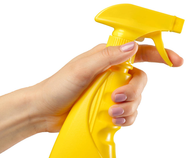 Hand with a cleaning product on white background - Фото, изображение