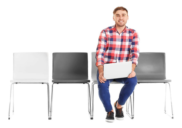 Young man waiting for job interview on white background - Fotografie, Obrázek