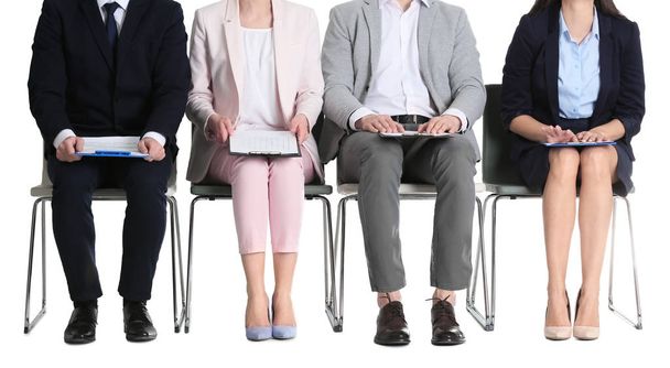 Group of people waiting for job interview on white background - Foto, imagen