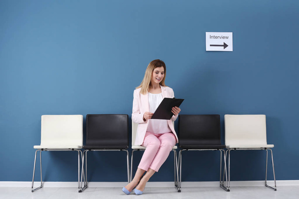 Young woman waiting for job interview, indoors - Photo, image