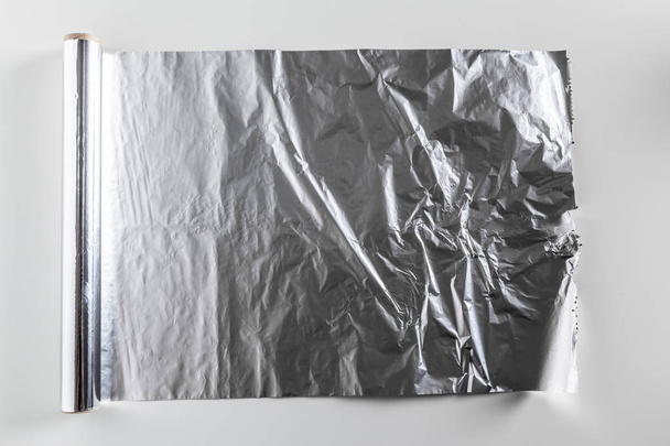 roll of aluminum foil isolated on white background - Photo, Image
