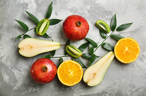 Set of fresh tropical fruits on grey background - Fotografie, Obrázek