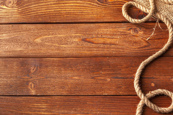 cuerda del barco en fondo de madera
 - Foto, Imagen
