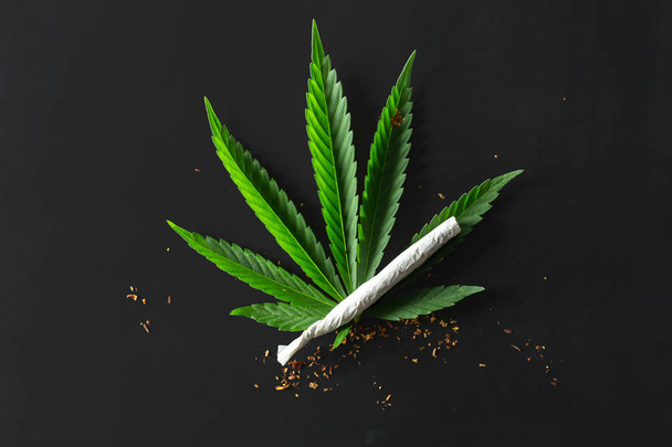 Close up of medical Marijuana on black background - Photo, image