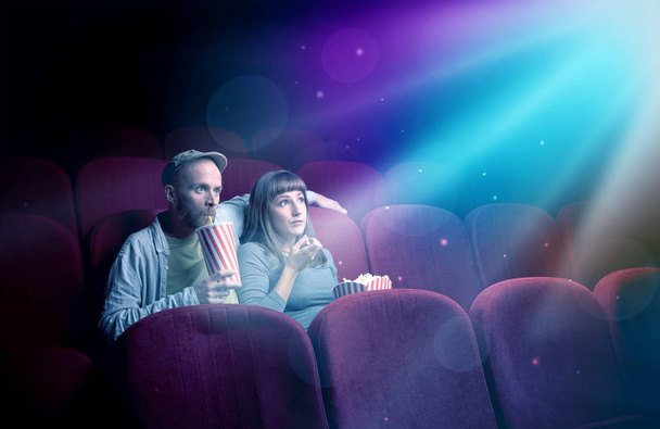 Teenager couple watching movie  - Foto, imagen