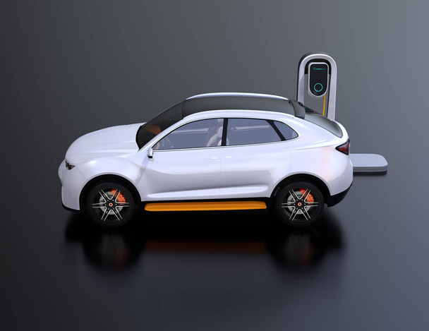 Μερική άποψη του λευκού ηλεκτρικό Suv αυτοκίνητο φόρτιση στο σταθμό φόρτισης. εικόνα απόδοση 3D. - Φωτογραφία, εικόνα