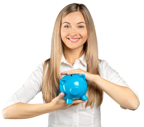 Portrait of young businesswoman with piggy bank isolated on white background - Foto, immagini