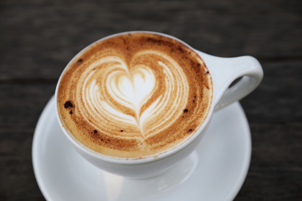 Cappuccino kávé-kupa, fa háttér - Fotó, kép
