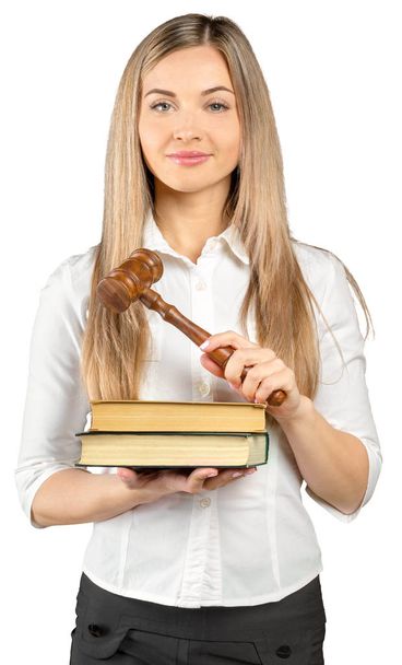 Female lawyer holding a gavel isolated on white background - Фото, изображение