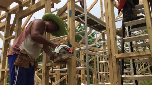 Cook Islanders building a new home in Rarotonga island Cook Islands. - Felvétel, videó